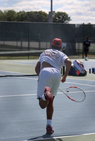 Junior Chris Wojtalik fires off a serve in Irish Netters practice. Chris played varsity doubles this year for Cathedral. “I’m not playing at my absolute best right now but I’m excited for the rest
of the season and what we can accomplish.”